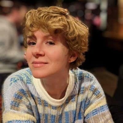 Photo of Floor Drees in an awesome knitted sweater.